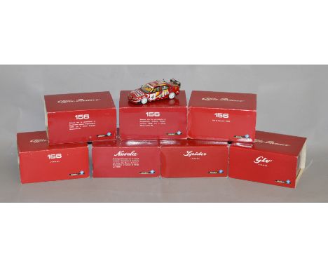 Seven boxed  1:43 scale diecast model Alfa Romeo cars by Solido. Each model comes in a lidded tin with cardboard sleeve. One 