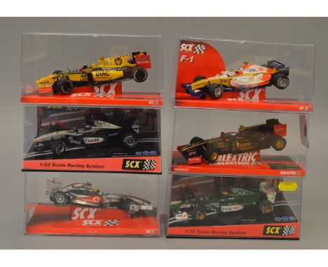 6 x SCX cars. Jaguar Racing Webber. McLaren F1 David. Renault F1 2010 Kubica. Vodafone McLaren Mercedes Race Car. ING Renault