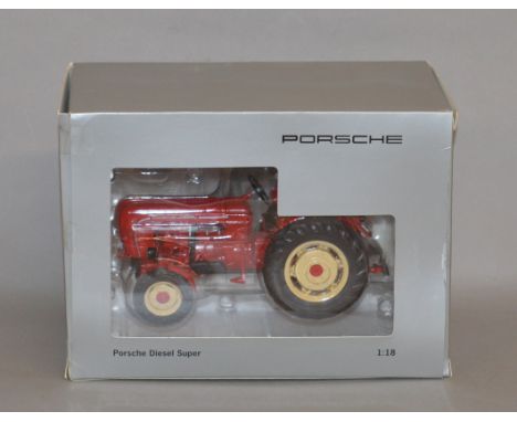 A boxed Minichamps 1:18 scale diecast model Porsche Diesel Super Tractor, in red, appears VG in G box.