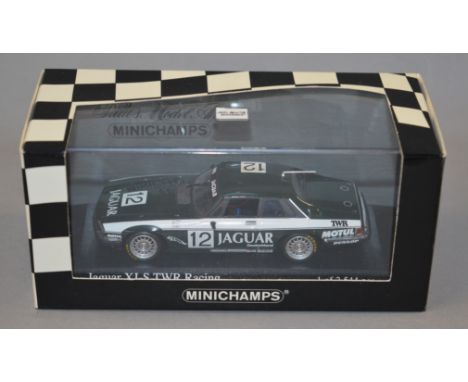 A boxed Minichamps Jaguar XJS TWR diecast model car in 1:43 scale, RN '12'. Model appears VG in VG box.