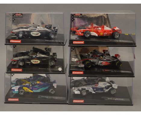 6 x Carrera cars. McLaren Mercedes MP 4/17 Driver No3. McLaren Mercedes MP4/15. Sauber Petronas C21 Livery 2003 No10. Ferrari