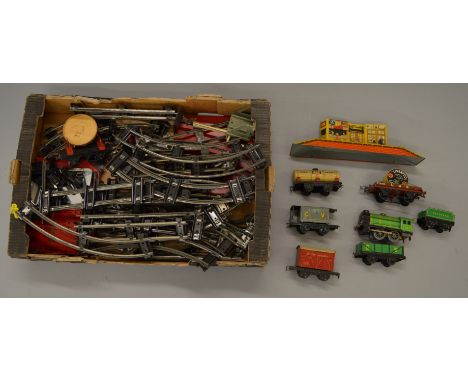 O Gauge. Chad Valley locomotive, rolling stock & track. Together with a tin of Meccano parts.
