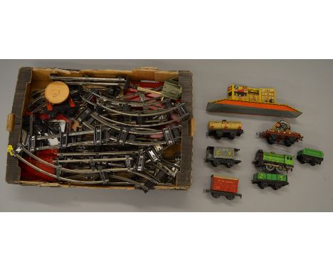 O Gauge. Chad Valley locomotive, rolling stock & track. Together with a tin of Meccano parts.