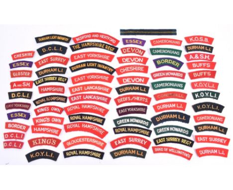 Selection of Cloth Regimental Shoulder Titles, consisting of embroidered examples from various regiments including Argyll & S