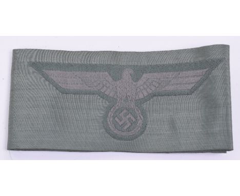 Five Un-issued German Army Combat Tunic Breast Eagles, all un-cut from the original manufactures roll. Mint condition. RE-OFF