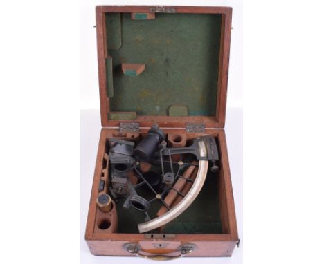 Cased Naval Sextant by Thomas Downie Hamburg, of blackened brass with makers details to the scale. Various lenses and fitting