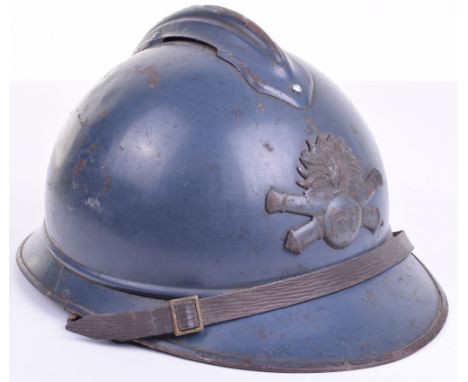 WW1 French Artillery Adrian Pattern Steel Combat Helmet, fine example retaining most of its original light Horizon Blue paint