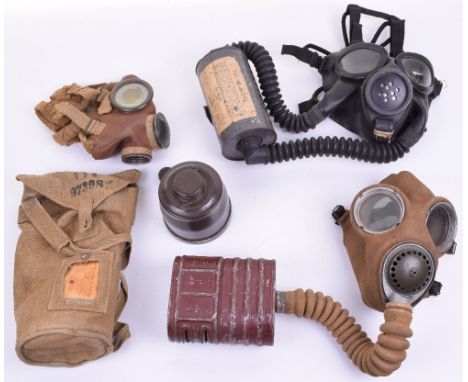 Three WW2 Military Gas Masks, consisting of WW2 Italian model T-35 gas mask with the original filter housed in the original c