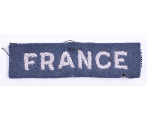 WW2 Free French Airforce Nationality Shoulder Title, embroidered light grey on RAF blue FRANCE. Good overall condition. 