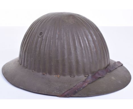 WW1 British Made Mild Steel Combat Helmet as Issued to Portuguese Army, good example retaining much of the original brown pai