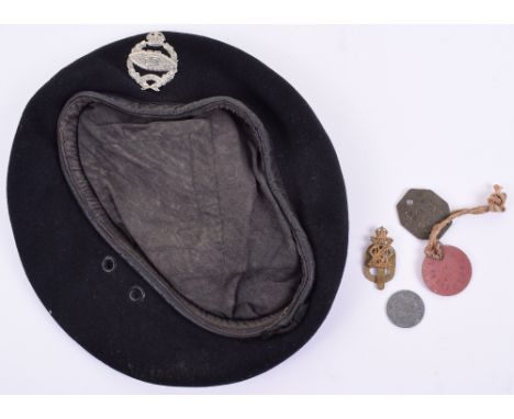 WW2 British Royal Tank Regiment (R.T.R) Black Beret, complete with original white metal cap badge. Black leather trim and bla