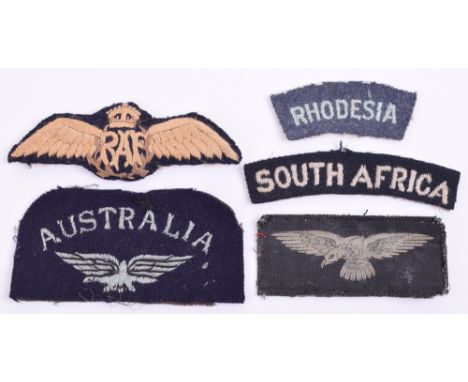 WW2 Royal Air Force Insignia, consisting of North Africa / Far East made cloth pilots wing, embroidered light blue on blue gr