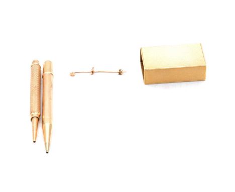 A 9 carat gold matchbox holder, two gold propelling pencils and a broken brooch pin, a 9 carat yellow gold matchbox holder, W
