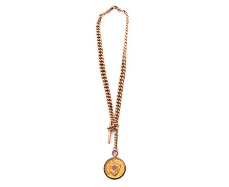 A rose metal double Albert watch chain and gold fob, the hollow curb links graduating from 5.6-7.1mm, fitted with a T bar, tw