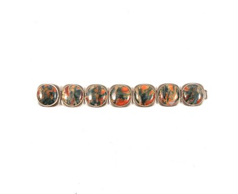 Bent Knudsen - a moss agate and silver panel bracelet, No. 35, 25mm gauge seven-panel design, each panel set with a circular 