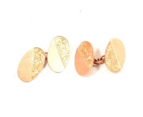 A pair of 9 carat rose gold chain link cufflinks, the oval faces half scroll engraved, no personal monograms, Birmingham 1921