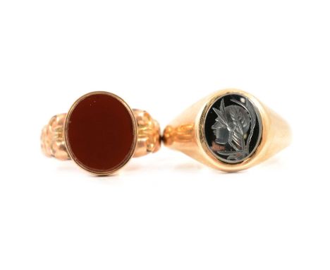 Two gemset gold signet rings, a 9 carat yellow gold signet ring, set with an oval carnelion, scroll shoulders, ring size M, h