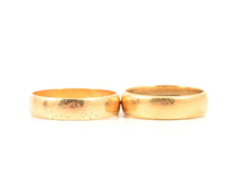 Two 18 carat yellow gold plain polished wedding bands, 5.3mm wide half D shape, ring size M, hallmarked Birmingham 1924; 4.7m