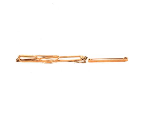 Two yellow metal tie bars marked 9ct, a 75mm bar with chain retainer; and a plain 45mm long bar, total weight 7.5g.Qty: 2