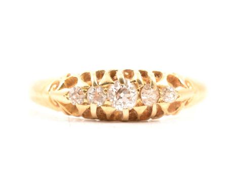 A diamond five stone ring, the five old brilliant and 8-cut stones claw set in an 18 carat yellow gold mount ring size O1/2, 