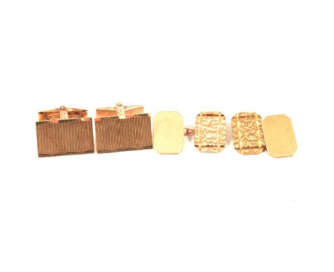 Two pairs of 9 carat yellow gold cufflinks, a pair of chamfered chain link cufflinks, one face plain and one bright cut and t