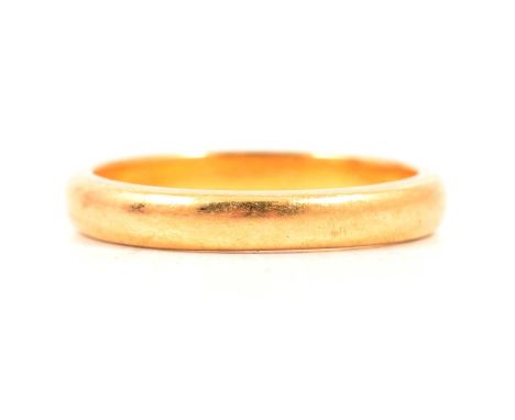 A 22 carat yellow gold wedding band, 3mm wide plain polished D shape ring size L, Chester 1934, 4g.