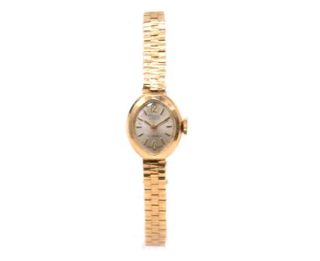 Rone - a lady's 9 carat yellow gold bracelet wristwatch, 14x11mm marquise shape champagne baton dial with Arabic 12 and 6 in 