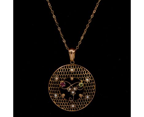 A pendant and chain with suffragette suggestions, 30mm circular honeycomb pierced mount set with seed pearls, peridot and pin