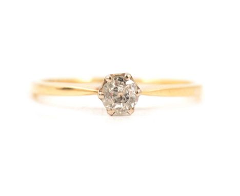 A diamond solitaire ring, the 4mm old cut stone claw set in a yellow and white metal mount ring size N, shank marked 18ct Pt,