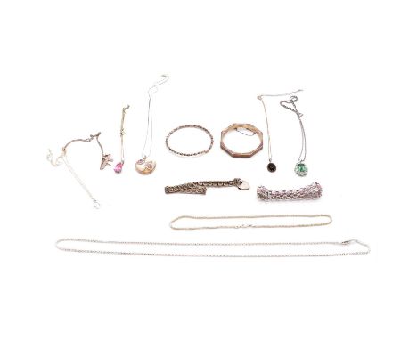 A collection of silver and white metal bracelets, pendants, chains and bangles, a silver heart pendant with diamond chip to c