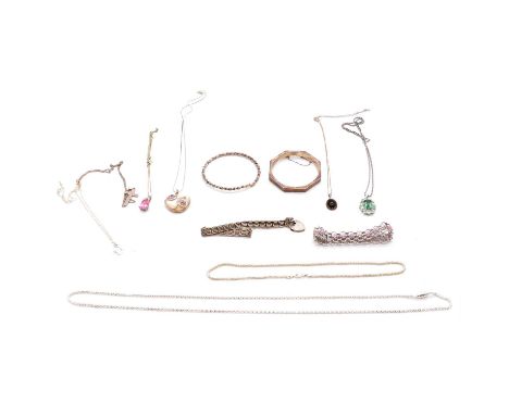 A collection of silver and white metal bracelets, pendants, chains and bangles, a silver heart pendant with diamond chip to c