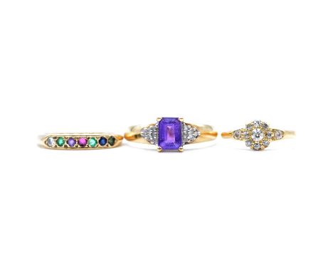 Three gemset rings, diamond, amethyst and diamond, multi-gemstone, a small diamond cluster ring, the central old cut stone su