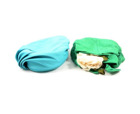Simone Mirman - five fabric hats, two green, one peacock coloured and one lighter turquoise, a cream hat with black diamond p