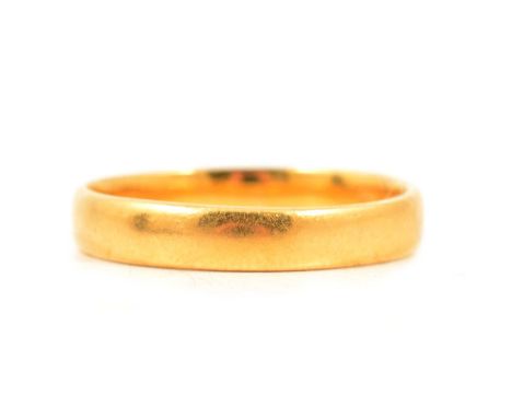 A 22 carat yellow gold wedding band, 3.7mm wide plain polished D shape ring size R, London 1923, 4g.