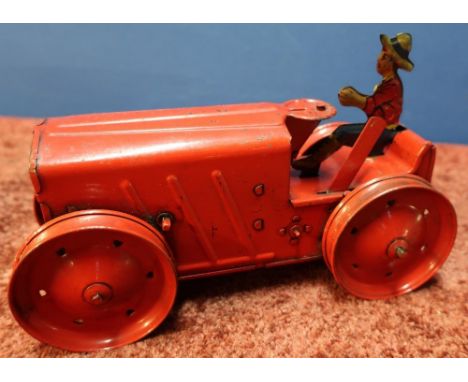 Tri-ang pre war clockwork tin-plate tractor with driver 