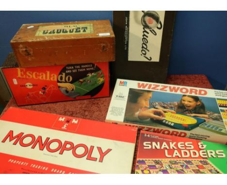 Boxed table croquet set and a selection of various assorted board games including Escalado by Chad Valley, Snakes &amp; Ladde