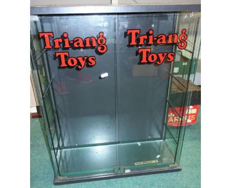 Glazed two door model display cabinet, the doors with transfer print for Tri-ang Toys (61cm x 25cm x 72cm) 