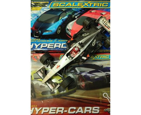 Boxed Micro Scale Hyper Cars Racing Set, boxed Scalextric Hyper Drive Set and a remote control F1 type car 