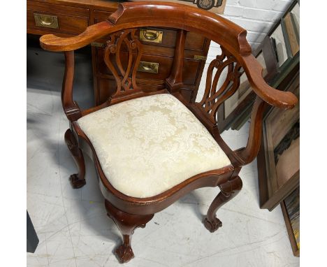 A CHINESE CHIPPENDALE STYLE CORNER CHAIR WITH CLAW AND BALL FEET