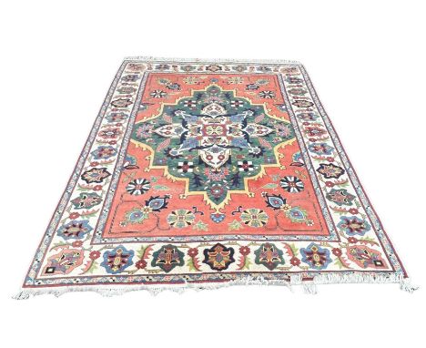 A PERSIAN DESIGN CARPET,300cm x 220cm