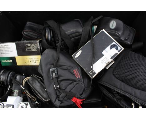 A COLLECTION OF VINTAGE CAMERAS INCLUDING SLRS, DSLRS, LENSES, DIGITAL COMPACTS, OPTICAL EQUIPMENT (QTY)