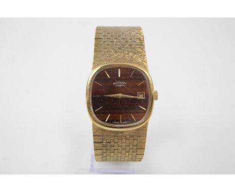 A GENTLEMAN'S ROTARY GOLD TONE TIGERS EYE WATCH,Hand-Wind.This watch is working.