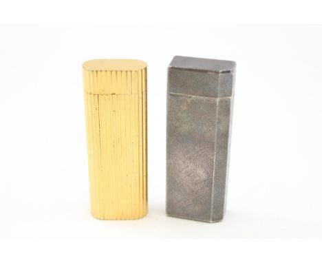 CARTIER PARIS VINTAGE POCKET LIGHTERS INCLUDING GOLD PLATED RIBBED FINISH AND SILVER PLATE,