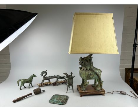 A GROUP OF CHINESE BRONZES TO INCLUDE A TEMPLE LION LAMP, BRONZE JUE, DRAGON HAND MIRROR, DRAGON, HORSE AND AN ANTIQUE PRAYER