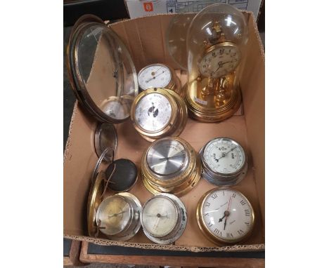 CARTON WITH BRASS &amp; WHITE METAL ANEROID BAROMETERS, TORSION CLOCK NEEDING REPAIR &amp; ROUND GLASS CLOCK FACES