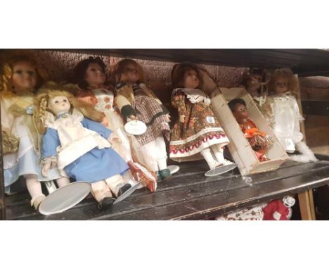 SHELF OF MISC PORCELAIN DOLLS ON STANDS &amp; 1 OTHER PLASTIC IN BOX