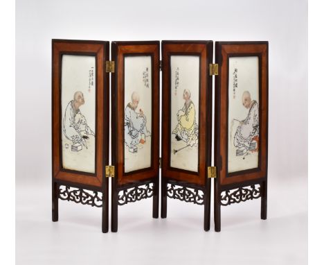 FOUR CHINESE ENAMELLED PORCELAIN ‘BUDDHIST’ PANELS, MOUNTED AS A TABLE SCREEN, 20TH CENTURY清 二十世纪  罗汉圖纹桌屏  一组四件Each rectangul