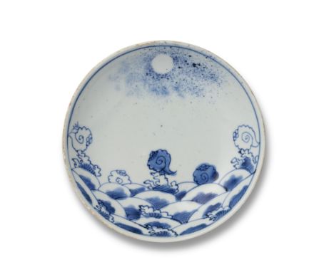 * TO BE SOLD WITHOUT RESERVE *A CHINESE BLUE AND WHITE PORCELAIN CIRCULAR ‘SHELL AND WAVE’ DISH, MING DYNASTY, TIANQI PERIOD,