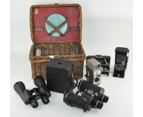 A collection of cameras, seven in total, to include a Kodak Six-20 Junior and Bell &amp; Howell 624 8mm film camera, and a pa