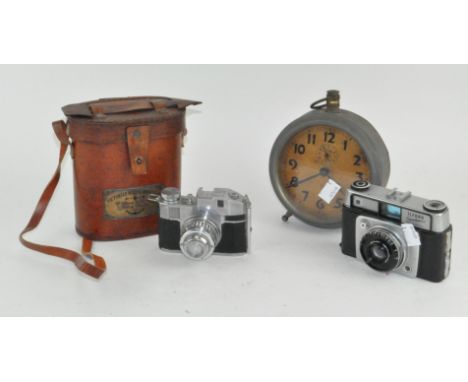 Two vintage film cameras; Ilford Sportsman and Bencini Comet S, together with an alarm clock and a pair of reproduction binoc